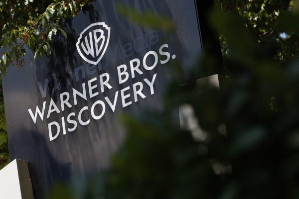 Stocks Leading Premarket Gains: Warner Bros. Discovery, Tesla, Robinhood, IonQ and Others